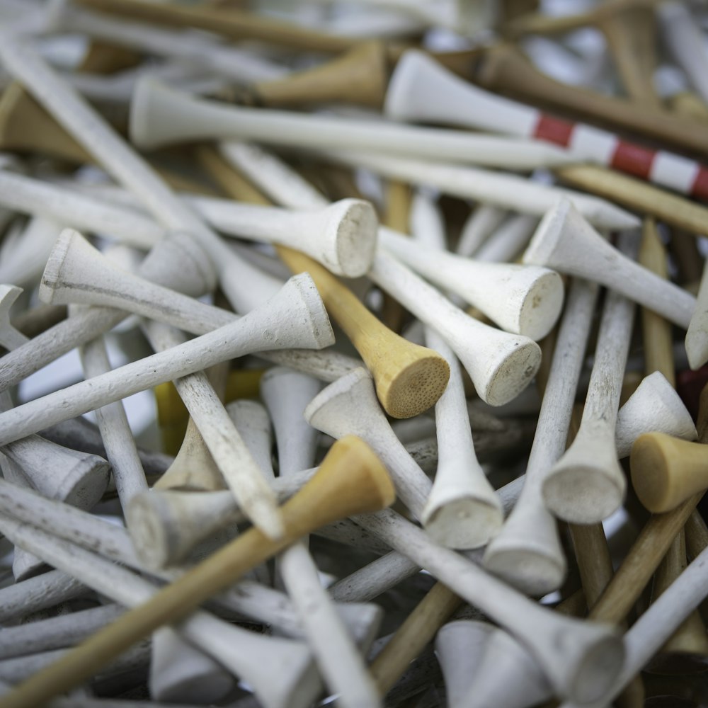 A bin of wooden tees